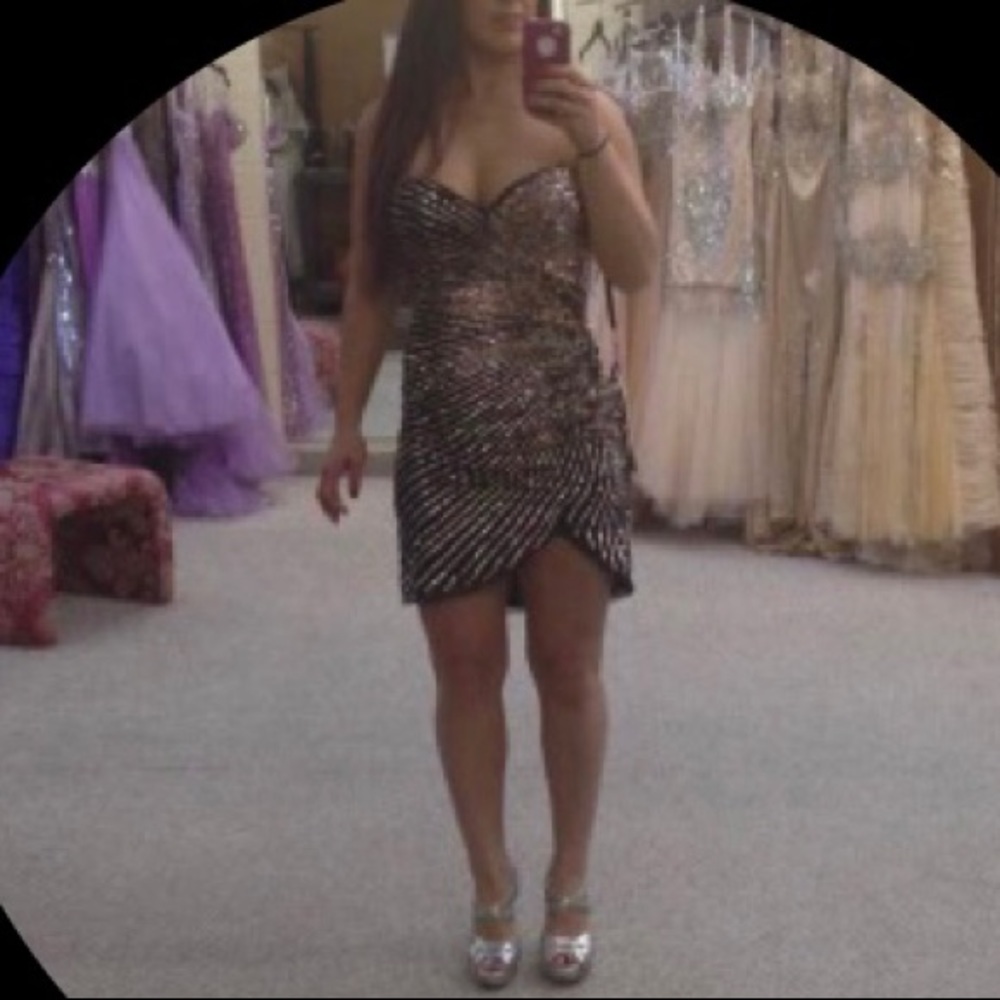 Never worn Terani Couture Dress black dress with multi color sequins.